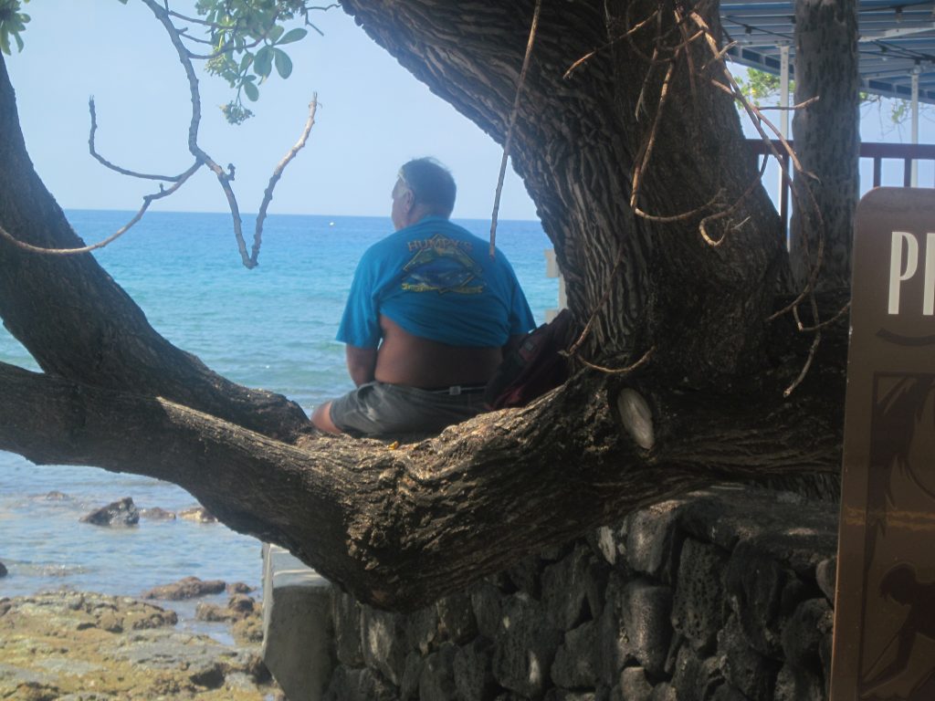 Man looking out to the ocean